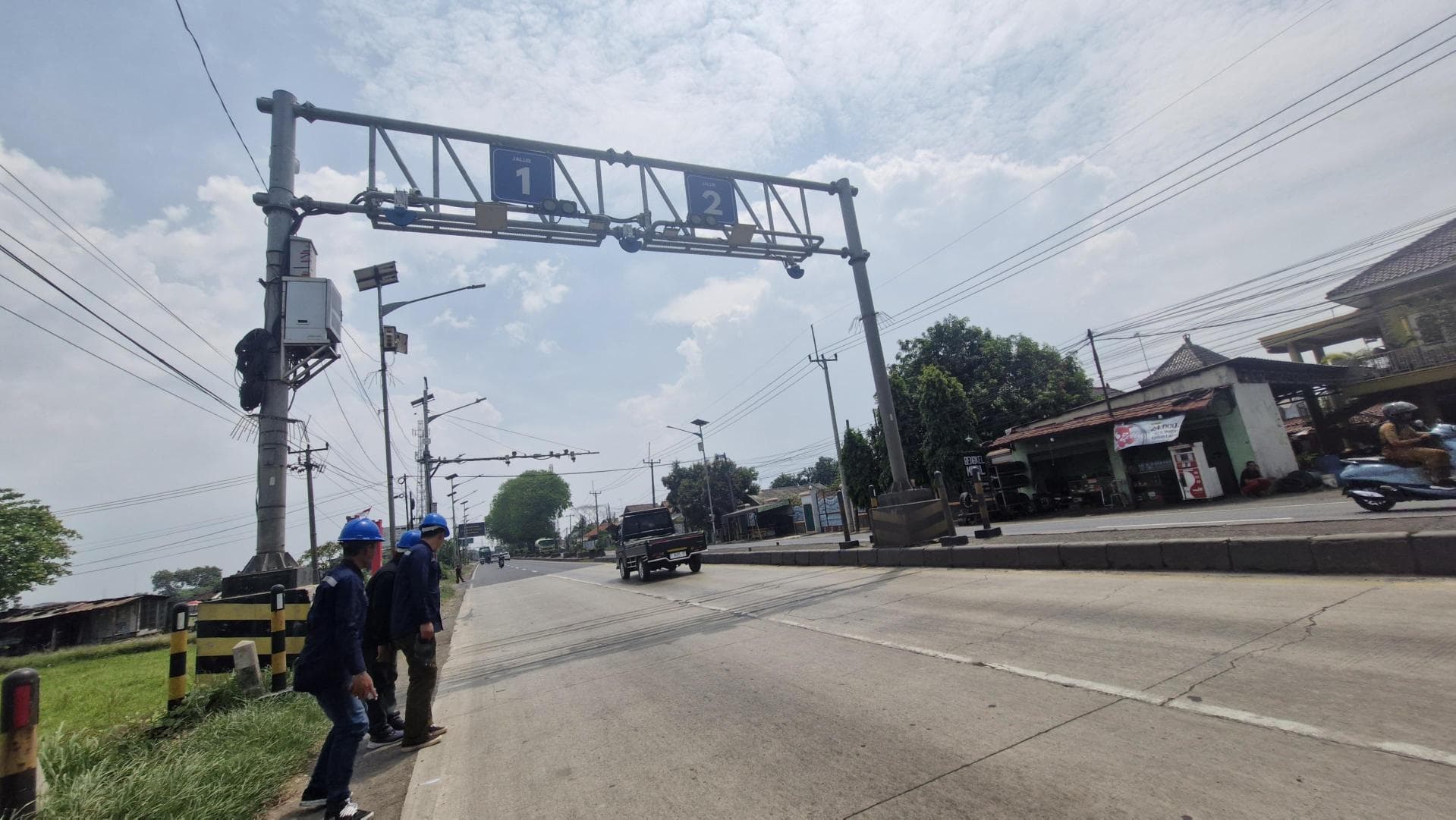 Sistem WIM di Indonesia untuk Menimbang Truk Tanpa Berhenti Sistem WIM di Indonesia untuk Menimbang Truk Tanpa Berhenti